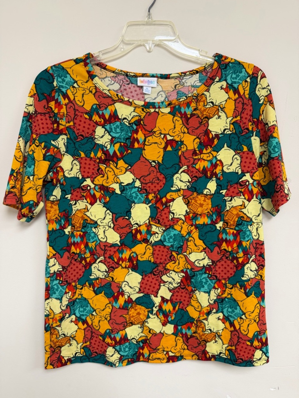 LuLaRoe Cream Multicolor Oogie Boogie Print Top